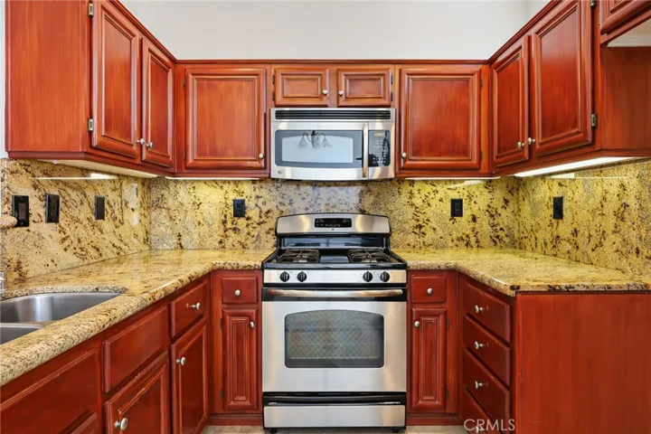 Granite countertop and backsplash.