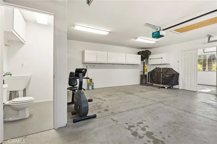 Triple Car Garage -1 side used as room.