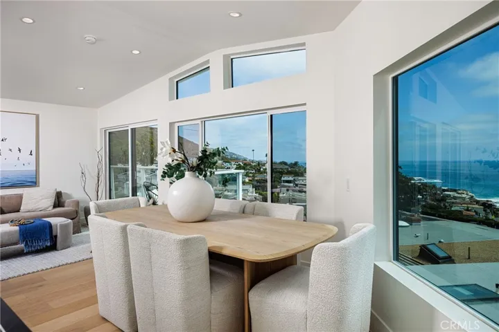 Main house: dining room showing views and looking toward living room