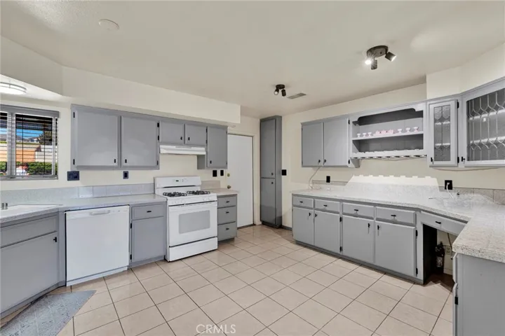 Thoughtfully designed kitchen w/ garage access.