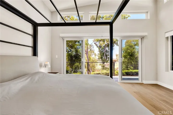 Bedroom leads to outdoor patio with view