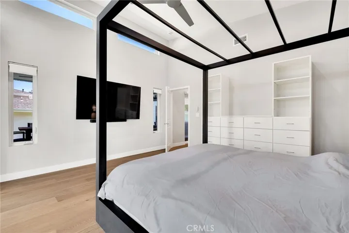 Bedroom has built-in drawers.