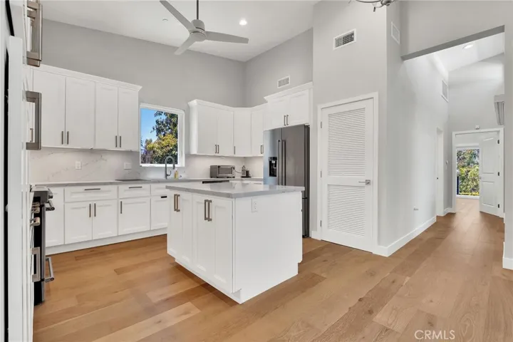 Gourmet Kitchen with Inside laundry in Cabinet