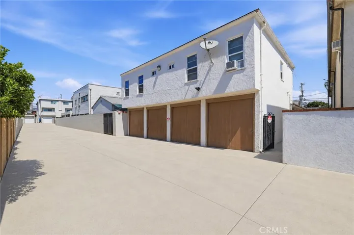 Attached garage for all three units