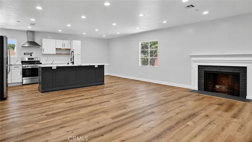 Main house living room, dining area and kitchen