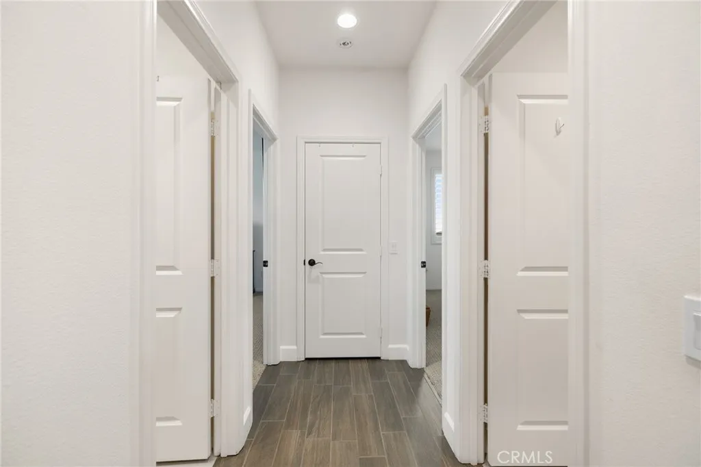 Access to 2 secondary bedrooms, full secondary bath and powder bath