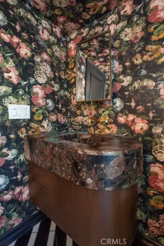 Guest Powder room with outside access to pool.