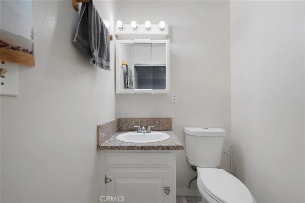 Lower level half bath.