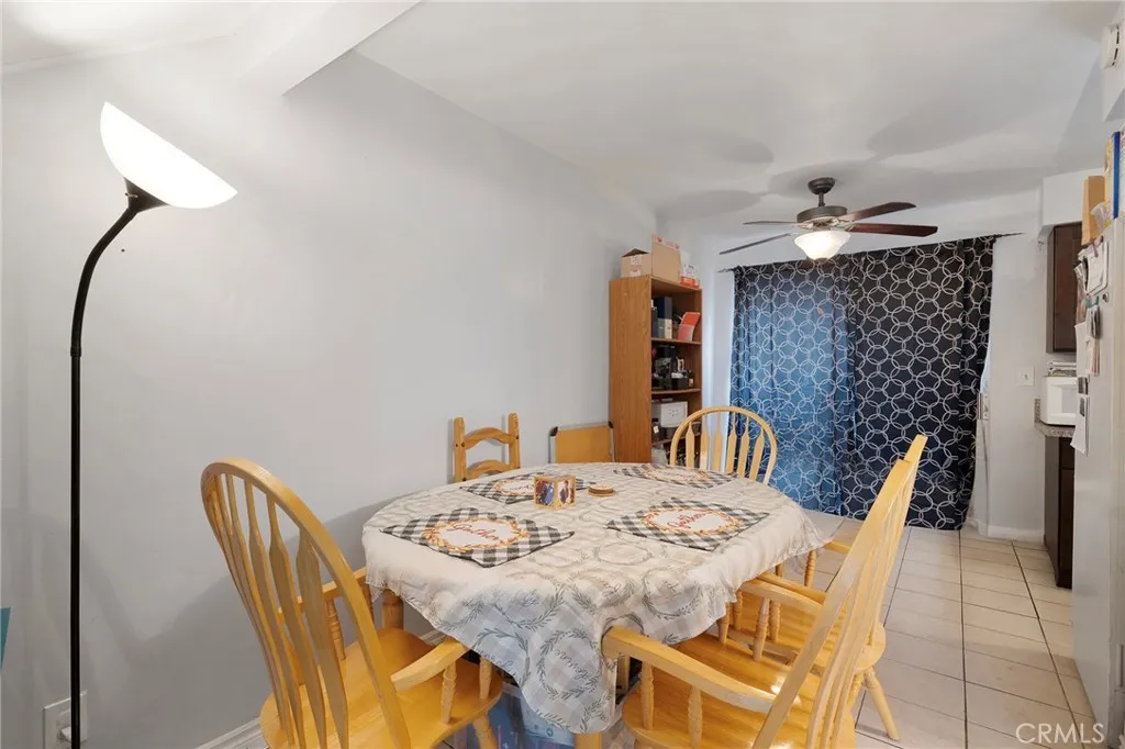 Dining area before the kitchen. Sliders to the patio.