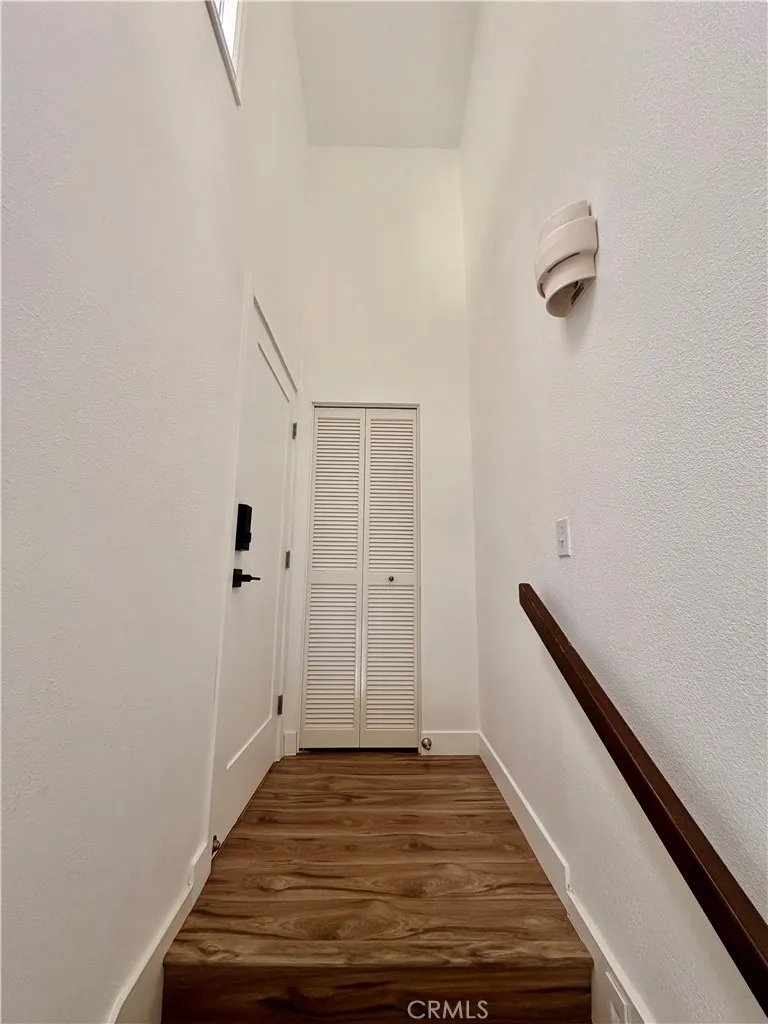 To the downstairs unit