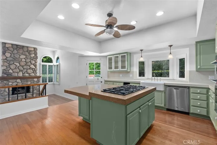 Large kitchen opening up to a cozy family room.