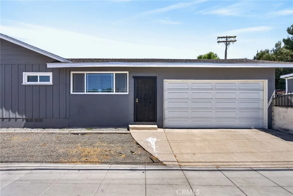 2-car garage and even more parking (gated yet) on the right side of the house (along California Avenue).