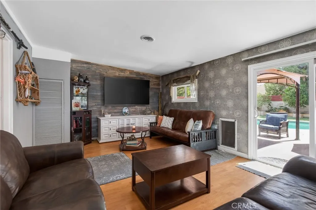 Familiy room overlooking the lovely backyard, with a convenient large doggy door for big pooches!