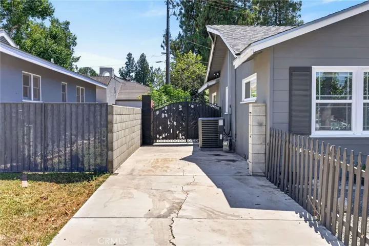 RV parking on left side of the house.