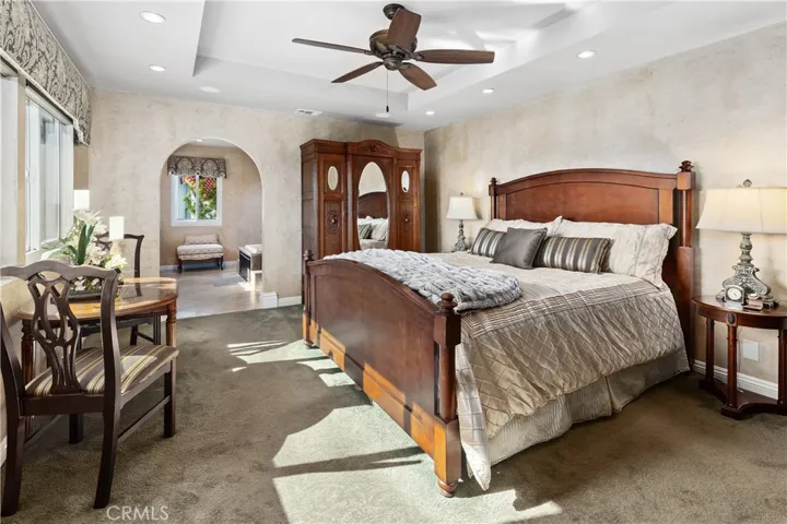 Your primary bedroom overlooking the rear yard and views