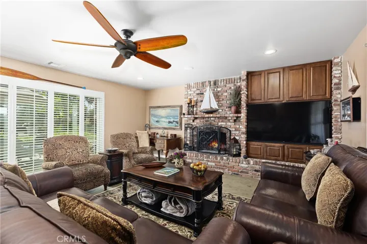 Grand family room with massive built-in TV and entertainment center