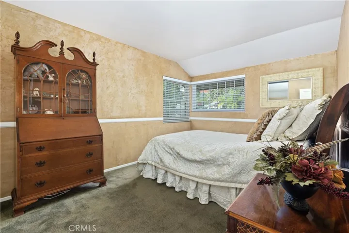 The third bedroom with custom-finished walls