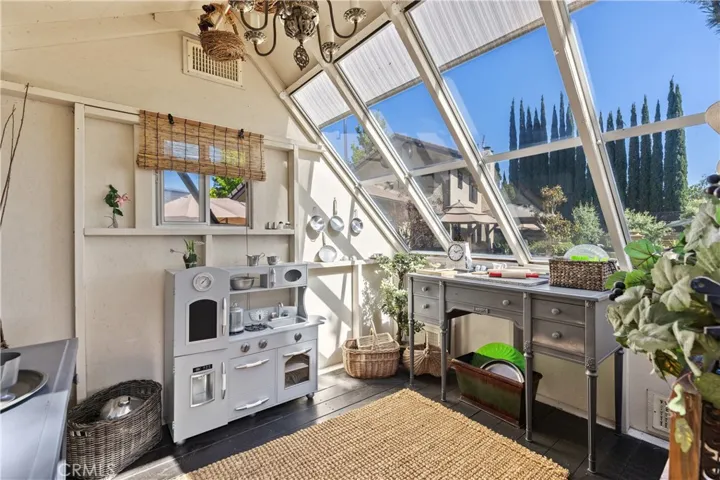 A playhouse, a greenhouse or even an office