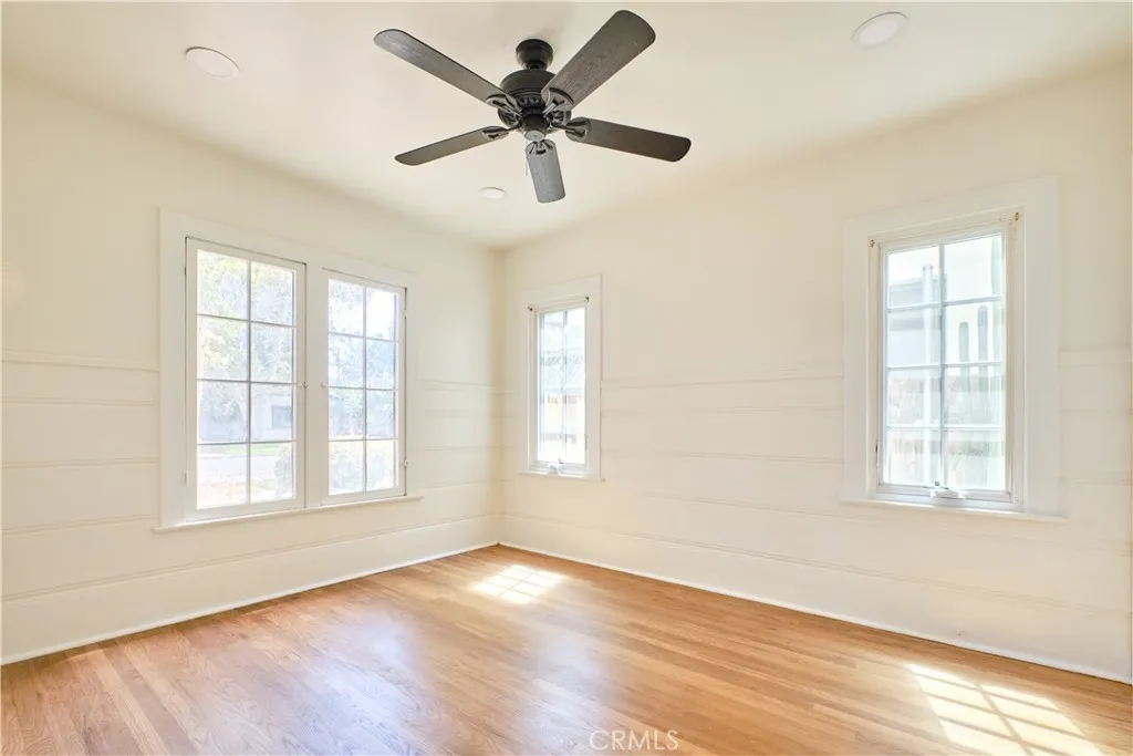 Bedroom1 Hardwood floors throughout, view of front yard