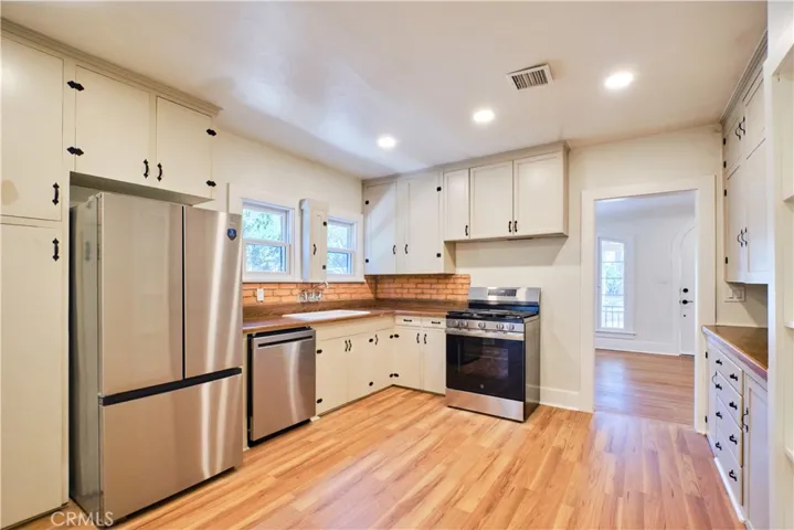 Kitchen new appliances and recessed lighting