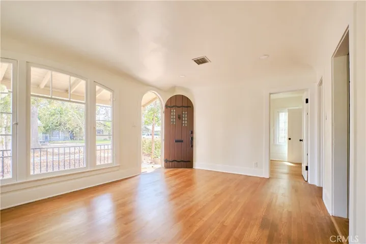 iving space with picture window view of front yard