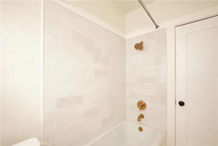 Bathroom new tile, new toilet, new sink, faucets