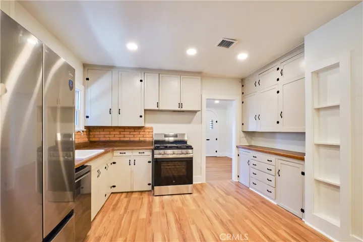 Kitchen new appliances and recessed lighting