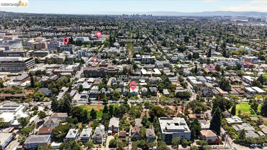 Aerial depiction of a city neighborhood featuring a mix of residential and commercial properties