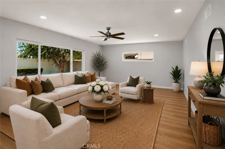 Another view of the inviting living area and fireplace feature wall.