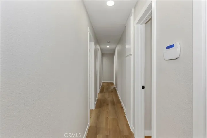 Central hallway providing convenient access throughout the home.