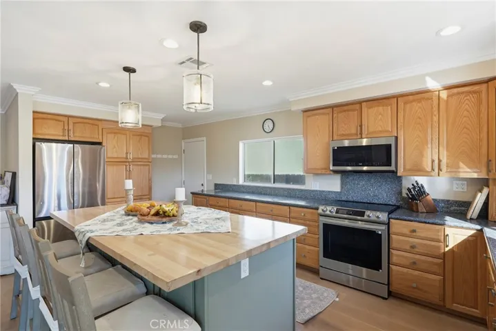 Door in kitchen leads to side yard