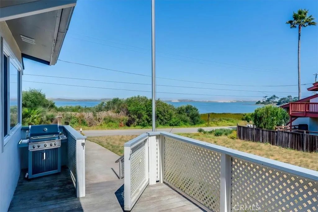 Virtually enhanced front side deck with BBQ.