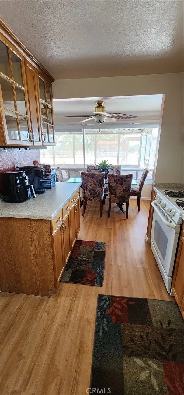 Primary house kitchen facing dining room