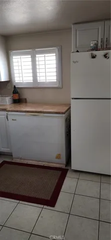 Casita kitchen has a refrigerator and separate deep freezer