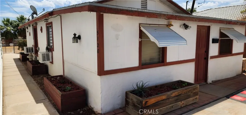 Back and side view of primary house