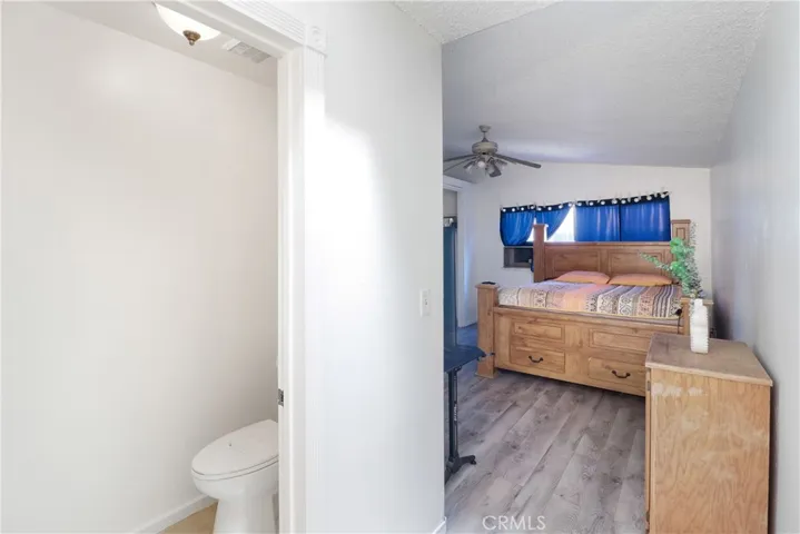 Primary Bathroom Looking Into Bedroom