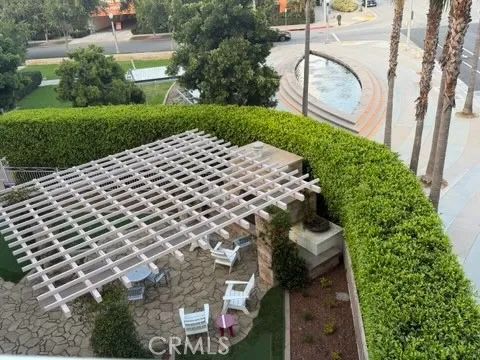 Overlook community fireplace, putting green and water fountain from corner balcony Overlook community fireplace, putting green and water fountain from corner balcony