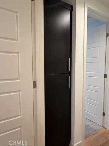 Linen closet by secondary bathroom