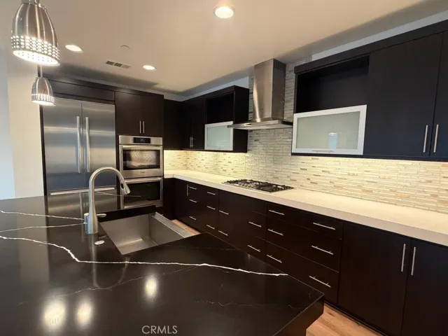 Kitchen with all stainless Bosch appliances