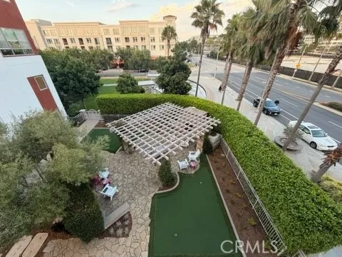 Overlook community fireplace, putting green and water fountain from den/office