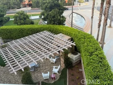 Overlook community fireplace, putting green and water fountain from corner balcony