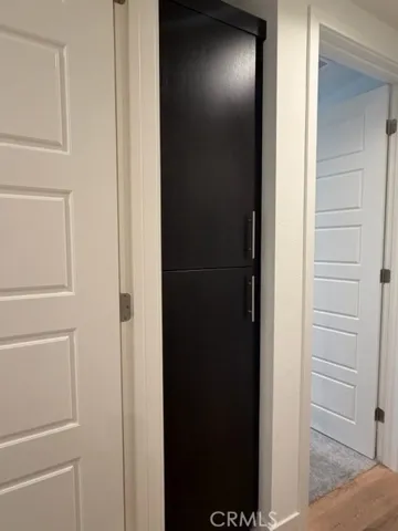 Linen closet by secondary bathroom