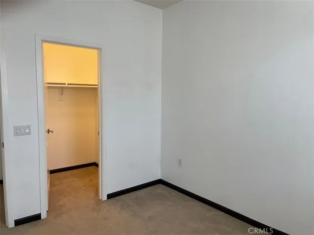 Walk in closet in 3rd bedroom