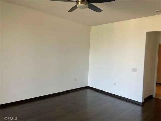 master bedroom has wood floor
