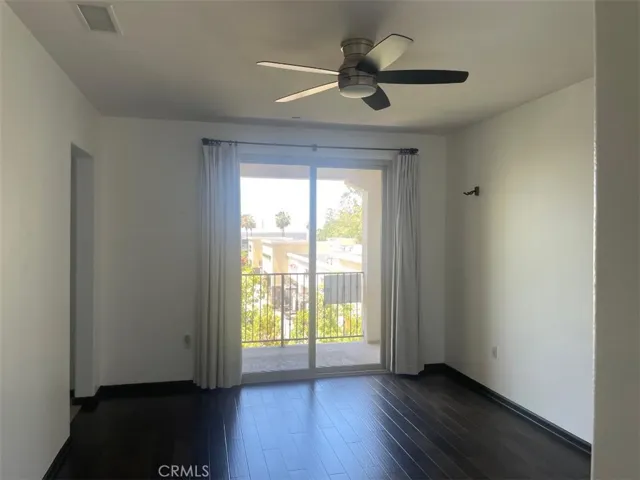 Large master bedroom with ceiling fan