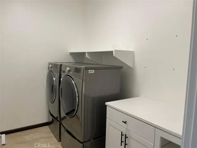 Laundry room with washer and dryer in 2nd floor