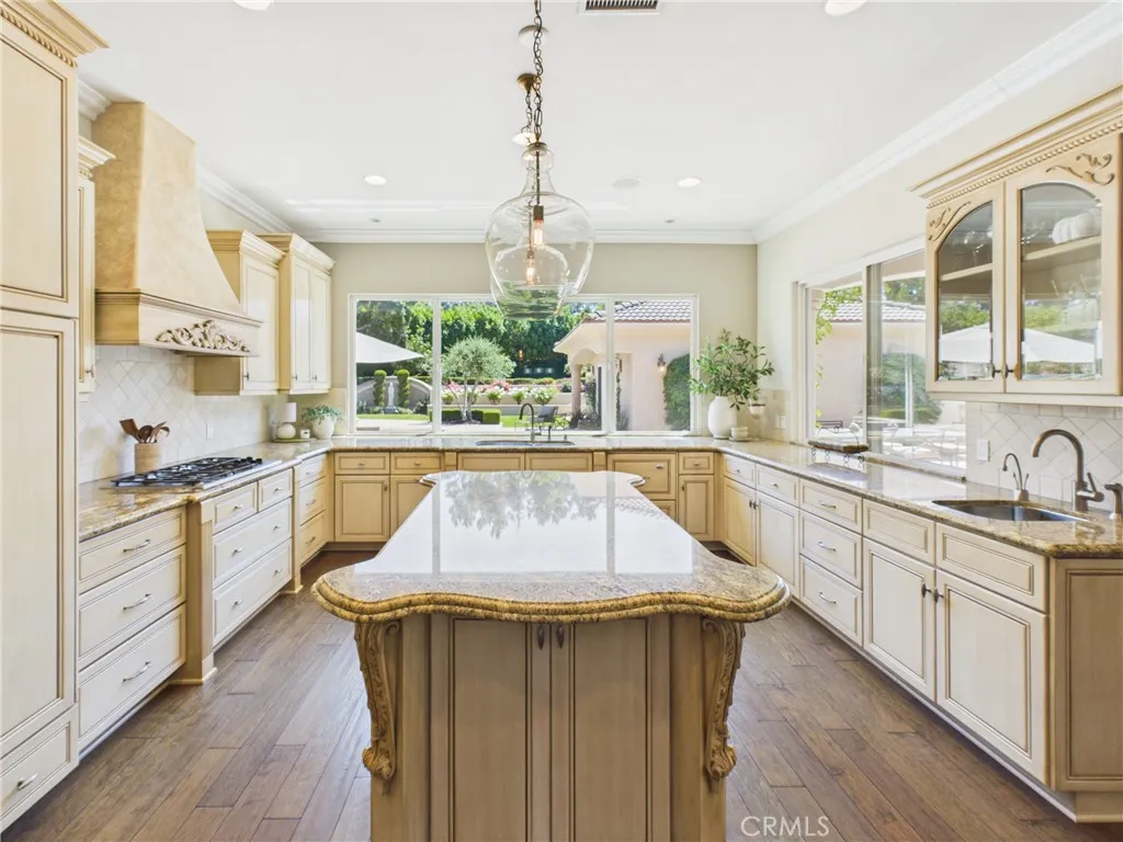 Retractable blinds on windows for shade, as well as, a serving window on the right hand side.