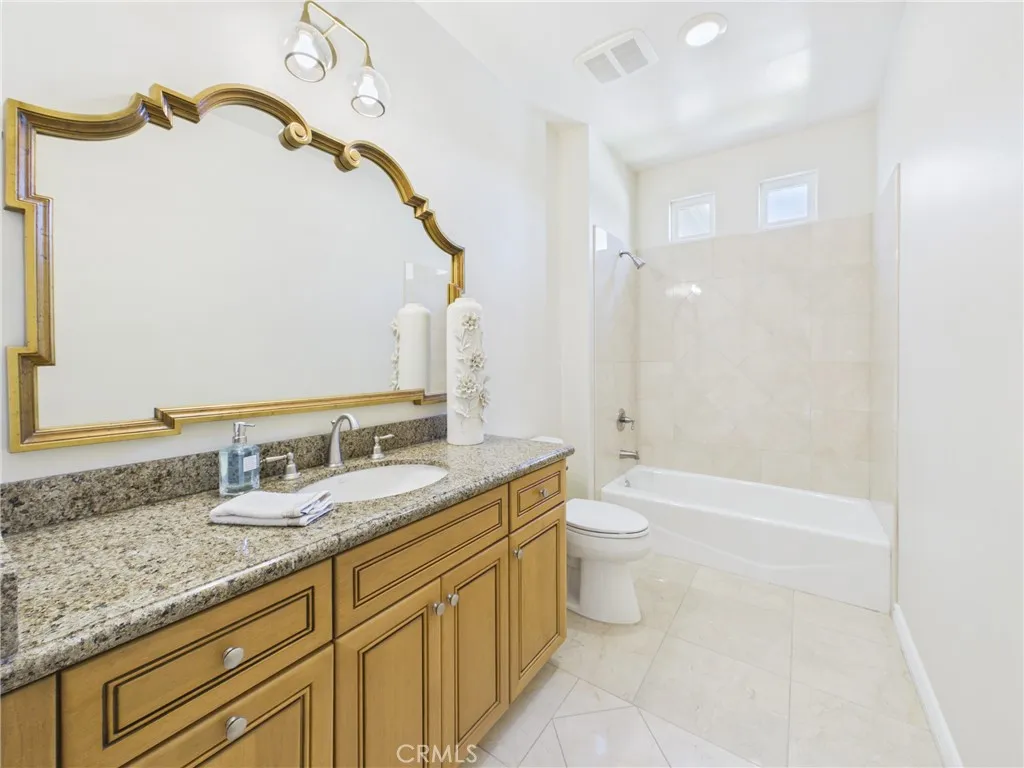 3rd bathroom in the hall next to 4th bedroom/office.