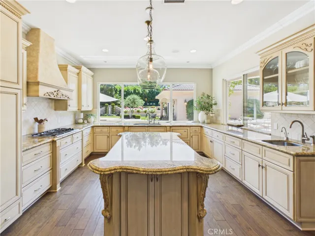 Retractable blinds on windows for shade, as well as, a serving window on the right hand side.