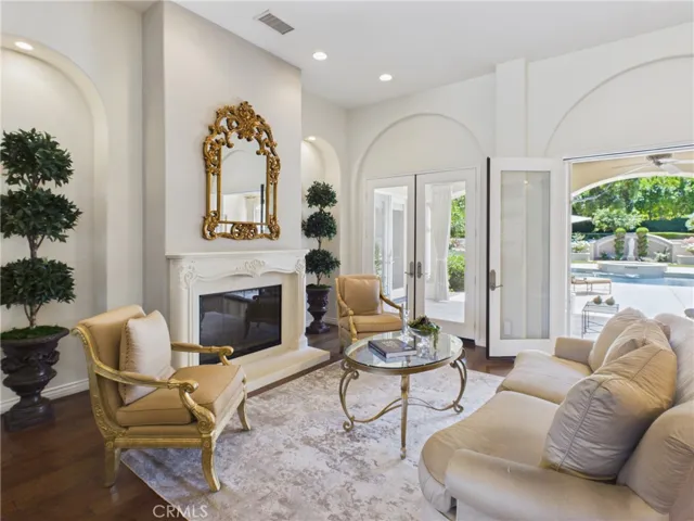 Formal living room with gas fireplace.
